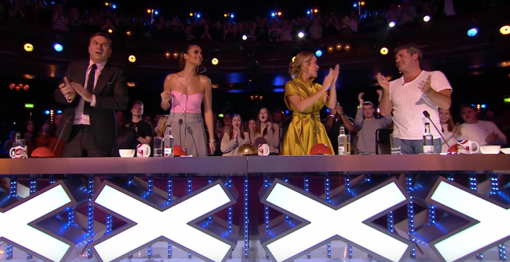 All four judges were on their feet