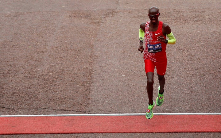 Farah crosses the line in fifth place.