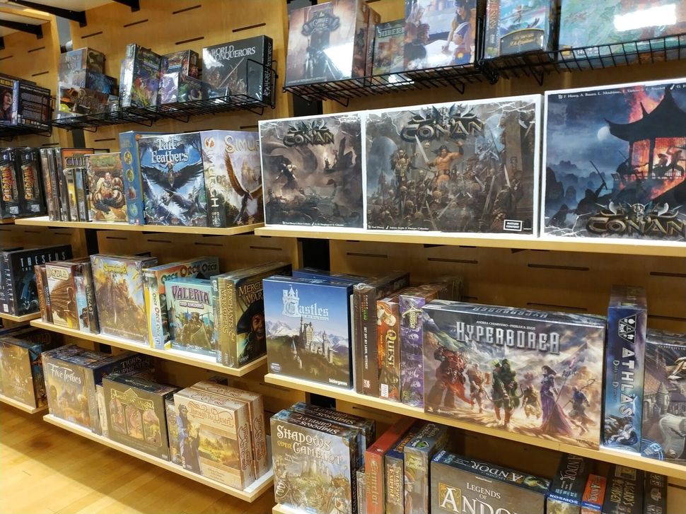 If you're new to board games, stores can be a little intimidating. We've picked seven great board games for you to try.
