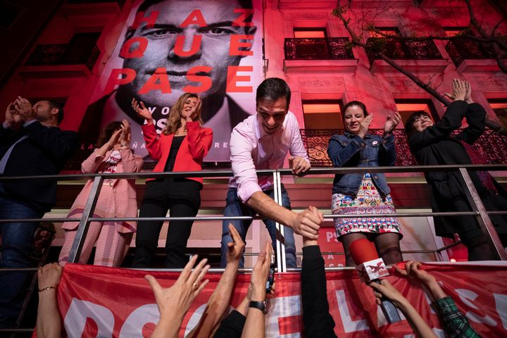 Socialist Party leader Pedro Sanchez shakes hands with supporters outside the party headquarters following the general election in Madrid, Spain, on April 28, 2019. 