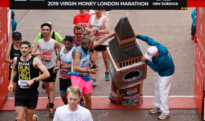 Lukas Bates had a towering presence at the London Marathon and was helped under the arch at the finish.