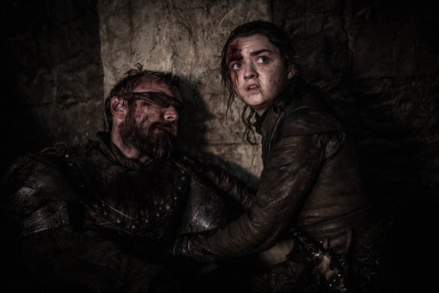 Arya Stark amid the destruction of Season