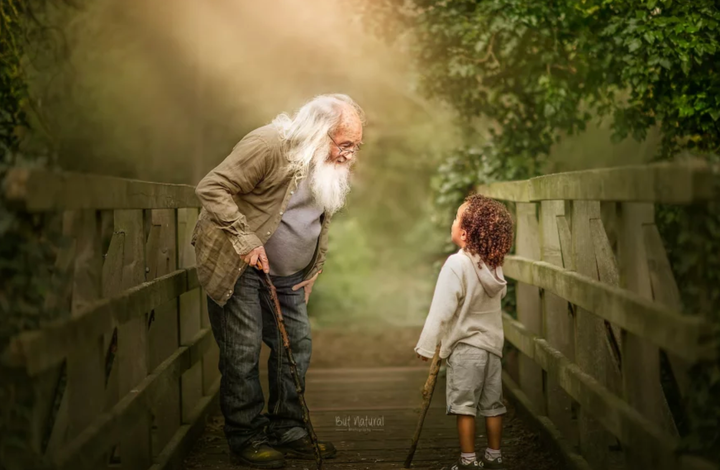 A granddad and his grandson share a special moment. 