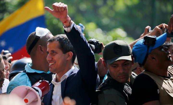 Juan Guaidó called on supporters to rise up against Maduro in a video on Tuesday.