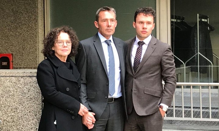 Derek Martindale with his wife Margaret and son John-Paul outside Fleetbank House in central London for the infected blood inquiry. 