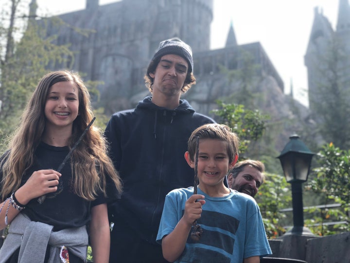 The Darnit Family: Johnna, AJ, Evan and Josh in the background.