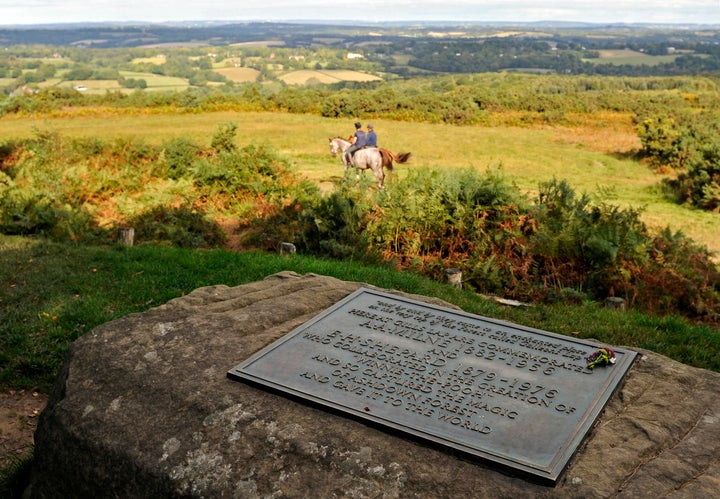 People ride horses through Ashdown Forest in East Sussex on Oct. 1, 2009.