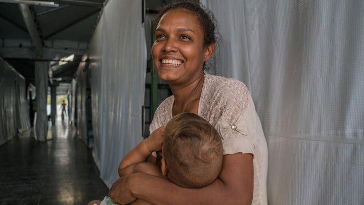 Mayerlin González and her husband traveled for more than 30 hours with 10-month-old baby Ronner before finally arriving in Brazil.