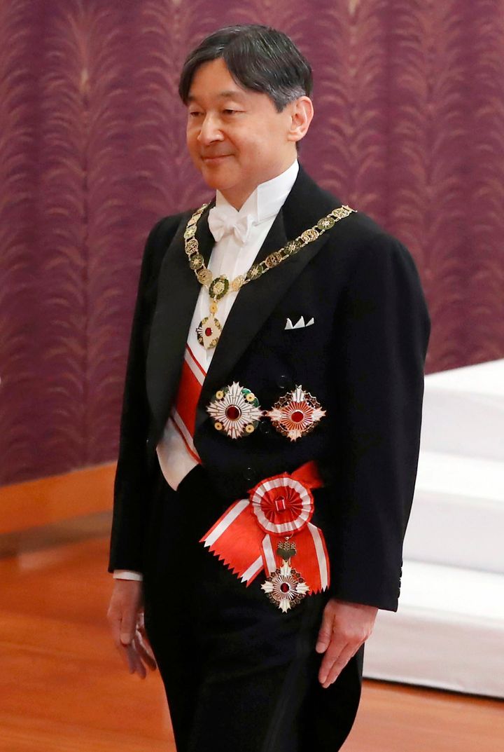 Japan's new Emperor Naruhito leaves after the ceremony to receive the Imperial regalia of sword and jewel as proof of succession at Imperial Palace in Tokyo, Wednesday, May 1, 2019. 