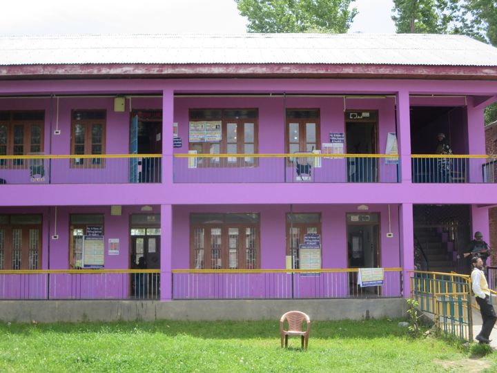 The bright pink-coloured higher secondary school where five polling stations have been set up.