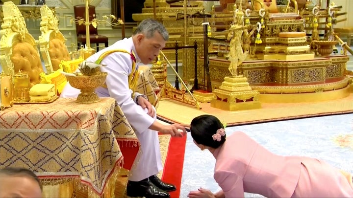 King Maha Vajiralongkorn and his consort, General Suthida Vajiralongkorn named Queen Suthida, attend their wedding ceremony in Bangkok on May 1, 2019, in this screen grab taken from a video.