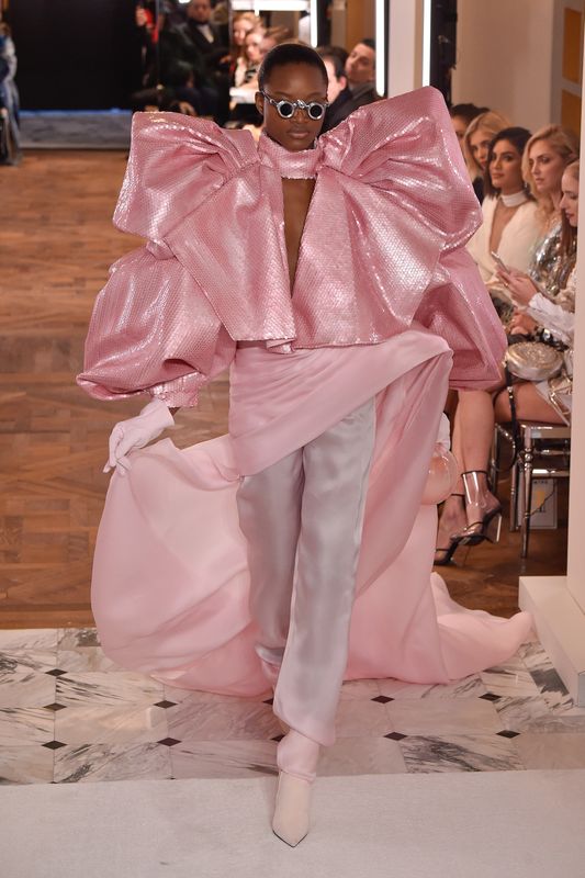 A model walks the runway during the Balmain spring/summer 2019 show on Jan. 23, 2019 in Paris.