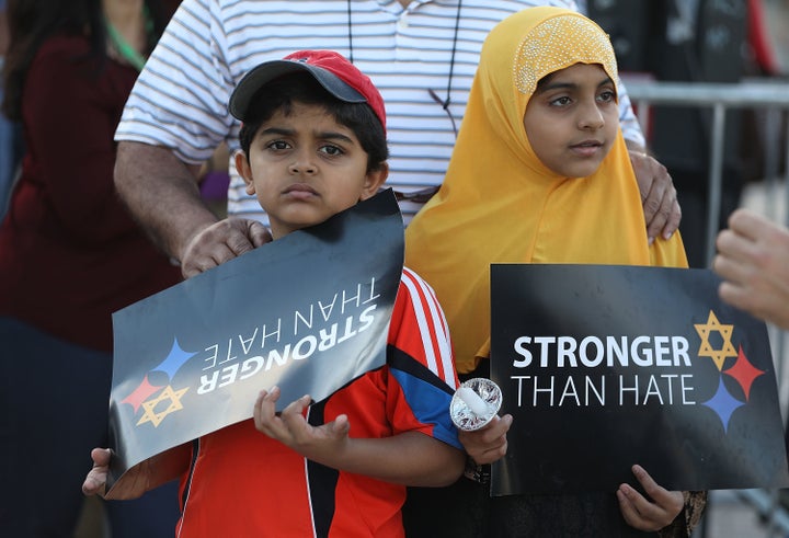 Children participate in a vigil in Miami on Oct. 30, 2018, in honor of the victims of a mass shooting at Pittsburgh's Tree of Life synagogue.