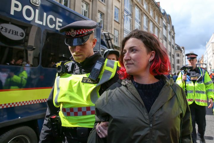 An XR protestor is arrested last month.