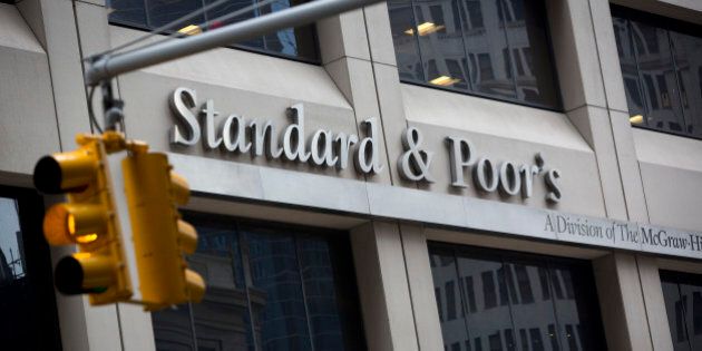 The Standard & Poor's logo is displayed at the company's headquarters in New York, U.S., on Tuesday, Feb. 5, 2013. The U.S. is seeking as much as $5 billion in penalties from McGraw-Hill Cos. and its Standard & Poor's unit to punish it for inflated credit ratings that Attorney General Eric Holder said were central to the worst financial crisis since the Great Depression. Photographer: Scott Eells/Bloomberg via Getty Images