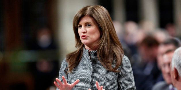 Canada's Public Works and Status of Women Minister Rona Ambrose speaks during Question Period in the House of Commons on Parliament Hill in Ottawa February 28, 2013. REUTERS/Chris Wattie (CANADA - Tags: POLITICS)