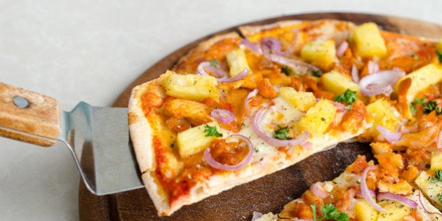 Hawaiian Chicken BBQ Italian Pizza on wood dish