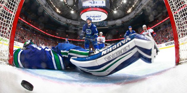 VANCOUVER, BC - MARCH 7: Paul Byron #41 of the Montreal Canadiens scores against Ryan Miller #30 of the Vancouver Canucks during their NHL game at Rogers Arena March 7, 2017 in Vancouver, British Columbia, Canada. (Photo by Jeff Vinnick/NHLI via Getty Images)