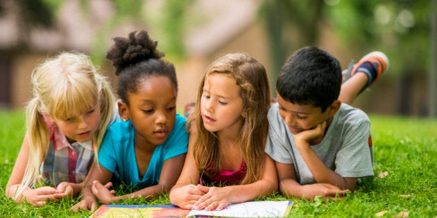 School kids play outside