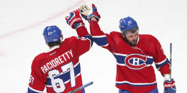 Apr 14, 2017; Montreal, Quebec, CAN; Montreal Canadiens right wing Alexander Radulov (47) celebrates his goal against New York Rangers with left wing Max Pacioretty (67) during an overtime period in game two of the first round of the 2017 Stanley Cup Playoffs at Bell Centre. Mandatory Credit: Jean-Yves Ahern-USA TODAY Sports