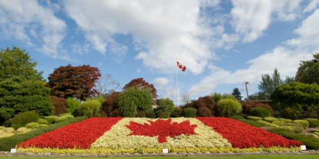 A Canadian flag made of flowers at the Peace Arch Border crossing between Canada and the United States, near Seattle, Washington and Vancouver, British Columbia. (Photo by Christopher Morris/Corbis via Getty Images)