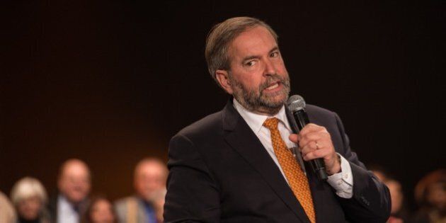 Canadian New Democratic Party (NDP) leader Tom Mulcair speaks at a rally in Montreal on October 18, 2015. Canadians go to the polls on October 19 with the option of choosing to 'stay the course' with the Conservatives or plump for change touted by the Liberals and New Democrats, in legislative elections too close to call. AFP PHOTO/NICHOLAS KAMM (Photo credit should read NICHOLAS KAMM/AFP/Getty Images)