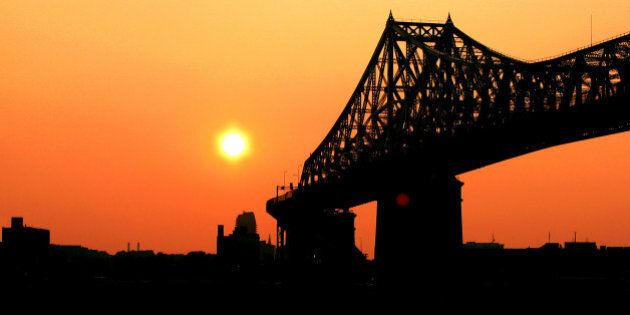 Opened to traffic on May 14, 1930, the Jacques Cartier bridge is a steel truss cantilever structure crossing the Saint Lawrence River from Montreal Island, Montreal, Quebec to the south shore at Longueuil, Quebec, Canada.
