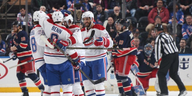 NEW YORK, NY - MARCH 04: Jordie Benn #8 of the Montreal Canadiens celebrates with teammates after scoring a goal in the third period against the New York Rangers at Madison Square Garden on March 4, 2017 in New York City. (Photo by Jared Silber/NHLI via Getty Images)