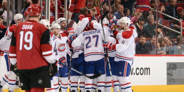 GLENDALE, AZ - FEBRUARY 09: Alex Galchenyuk #27 of the Montreal Canadiens celebrates with teammates after scoring the game winning goal in overtime as Shane Doan #19 of the Arizona Coyotes watches at Gila River Arena on February 9, 2017 in Glendale, Arizona. The Canadiens defeated the Coyotes 5-4. (Photo by Norm Hall/NHLI via Getty Images)