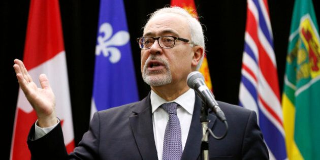Quebec's Minister of Finance Carlos Leitao addresses the media before a meeting of Canada's Provincial Finance Ministers in Ottawa, Canada December 21, 2015. REUTERS/Blair Gable