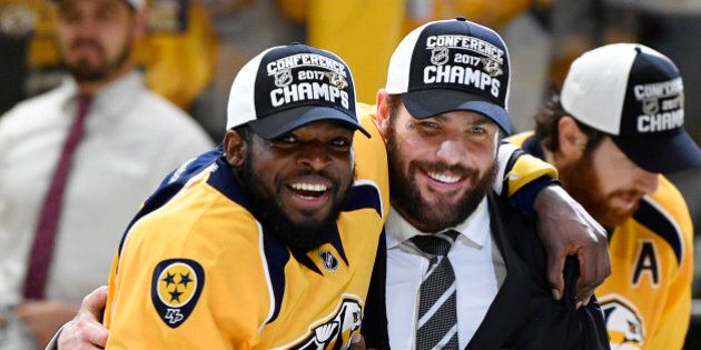 May 22, 2017; Nashville, TN, USA; Nashville Predators defenseman P.K. Subban (76) and center Mike Fisher (12) celebrate after a 6-3 win against the Anaheim Ducks in game six of the Western Conference Final of the 2017 Stanley Cup Playoffs at Bridgestone Arena. Mandatory Credit: Christopher Hanewinckel-USA TODAY Sports