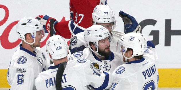 Apr 7, 2017; Montreal, Quebec, CAN; Tampa Bay Lightning right wing Nikita Kucherov (86) and teammates celebrates his goal against Montreal Canadiens during the first period at Bell Centre. Mandatory Credit: Jean-Yves Ahern-USA TODAY Sports