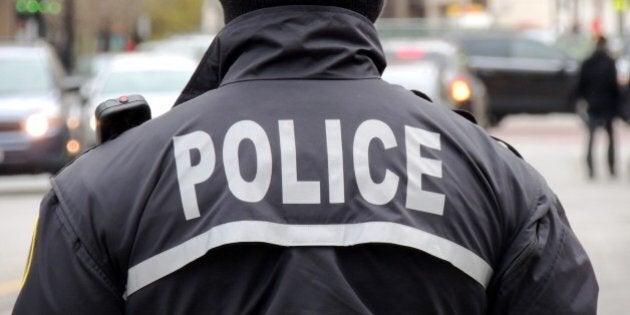 American policeman controlling the traffic in an urban area of Chicago