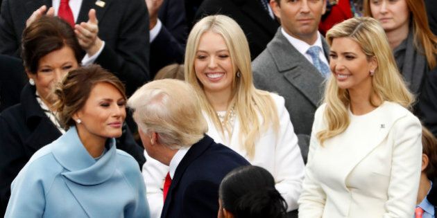 Donald Trump greets his wife Melania and his daughters Tiffany and Ivanka during inauguration ceremonies to be sworn in as the 45th president of the United States at the U.S. Capitol in Washington, U.S., January 20, 2017. REUTERS/Kevin Lamarque