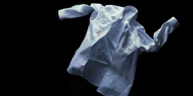 White shirt underwater with stains