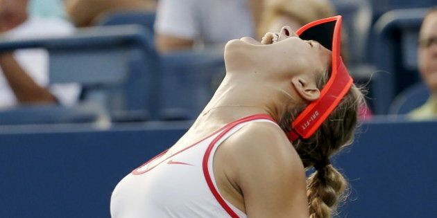 Eugenie Bouchard of Canada celebrates her win over Dominika Cibulkova of Slovakia in their women's singles third round match at the U.S. Open Championships tennis tournament in New York, September 4, 2015. REUTERS/Mike Segar
