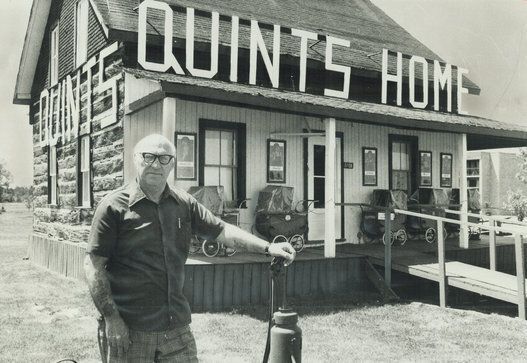 Stan Guignard stands outside former home of Dionne quintuplets that he bought and turneed into a mus