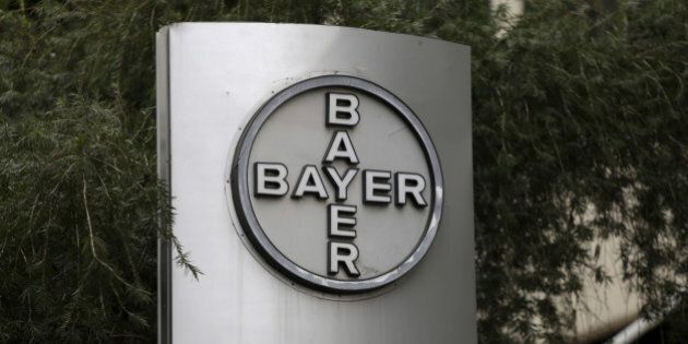 The corporate logo of Bayer is seen at the headquarters building in Caracas March 1, 2016. Picture taken March 1, 2016. REUTERS/Marco Bello/File Photo TPX IMAGES OF THE DAY