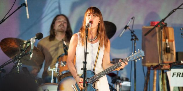 COLOGNE, GERMANY - AUGUST 21: Feist performs on stage at the Tanzbrunnen on August 21, 2012 in Cologne, Germany. (Photo by Peter Wafzig/Redferns via Getty Images)