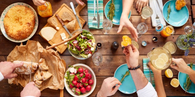 Extended family having a meal, directly above view