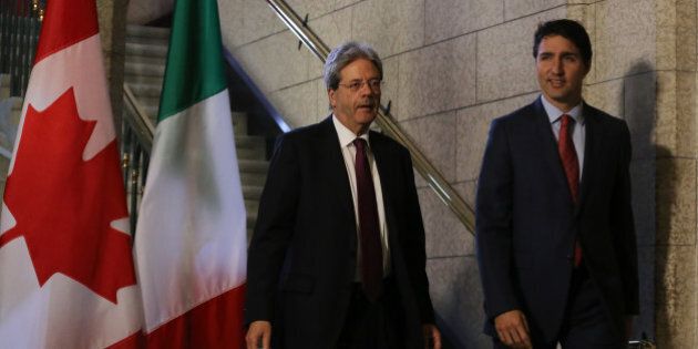 Canadian Prime Minister Justin Trudeau (R) and Prime Minister Paolo Gentiloni of Italy, arrive for a joint press conference in Ottawa, Ontario, April 21, 2017. / AFP PHOTO / Lars Hagberg (Photo credit should read LARS HAGBERG/AFP/Getty Images)