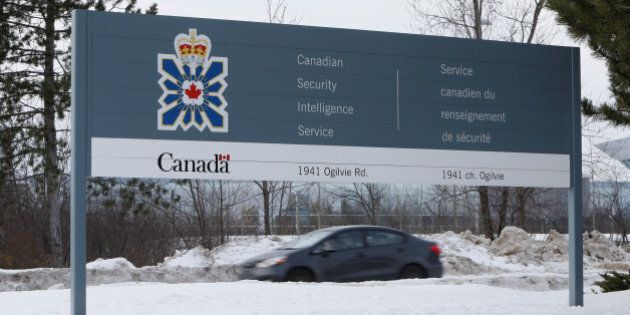 A vehicle passes a sign outside the Canadian Security Intelligence Service (CSIS) headquarters in Ottawa, Ontario, Canada January 17, 2017. REUTERS/Chris Wattie