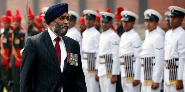 Canada's Defence Minister Harjit Sajjan inspects an honour guard during his ceremonial reception in New Delhi, India April 18, 2017. REUTERS/Adnan Abidi