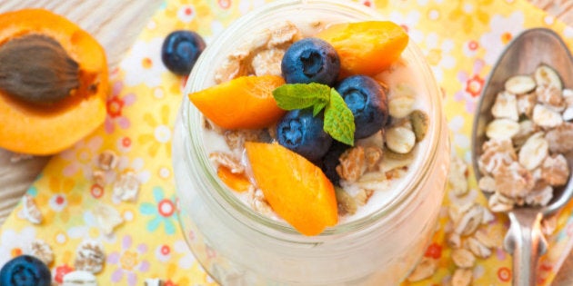 Homemade yogurt with granola, blueberries and apricots. Selective focus.