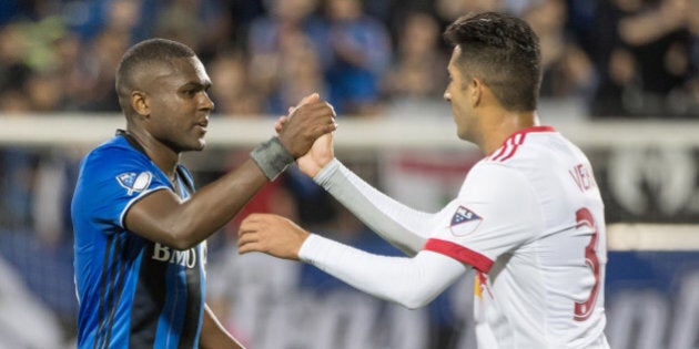 Jun 3, 2017; Montreal, Quebec, CAN; Montreal Impact defender Chris Duvall (18) shakes hand with New York Red Bulls midfielder Gonzalo Veron (30) following their game at the Saputo Stadium in Montreal, Quebec, Canada. The Impact defeated the Red Buls 1-0. Mandatory Credit: Marc DesRosiers-USA TODAY Sports