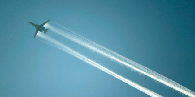 A U.S.-led coalition aircraft flying over Kobanii, as seen from near the Mursitpinar border crossing on the Turkish-Syrian border in the southeastern town of Suruc in Sanliurfa province October 15, 2014. American-led forces conducted 21 airstrikes near Kobani, Syria, in the last two days to slow the advance of Islamic State militants, the U.S. military said on Tuesday, warning the situation on the ground is fluid as militants try to gain territory. REUTERS/Kai Pfaffenbach (TURKEY - Tags: MILITARY CONFLICT POLITICS)