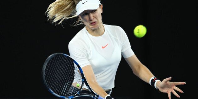 MELBOURNE, AUSTRALIA - JANUARY 20: Eugenie Bouchard of Canada plays a forehand in her third round match against Coco Vandeweghe of the United States on day five of the 2017 Australian Open at Melbourne Park on January 20, 2017 in Melbourne, Australia. (Photo by Cameron Spencer/Getty Images)