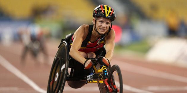 DOHA, QATAR - OCTOBER 26: Marieke Vervoort of Belgium wins the women's 100m T52 final during the Evening Session on Day Five of the IPC Athletics World Championships at Suhaim Bin Hamad Stadium on October 26, 2015 in Doha, Qatar. (Photo by Warren Little/Getty Images)