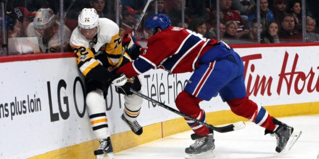 Jan 18, 2017; Montreal, Quebec, CAN; Pittsburgh Penguins right wing Patric Hornqvist (72) is checked into the boards by Montreal Canadiens defenseman Shea Weber (6) during the first period at Bell Centre. Mandatory Credit: Jean-Yves Ahern-USA TODAY Sports