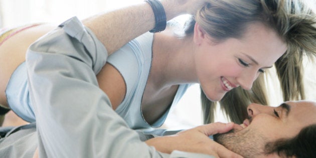 Young couple about to kiss.